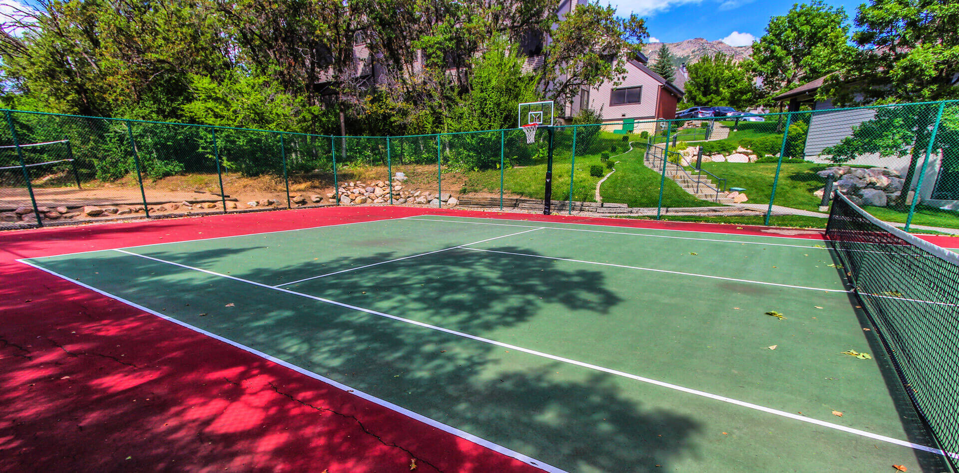 A spacious tennis court at VRI's Wolf Creek Village I in Eden, Utah.